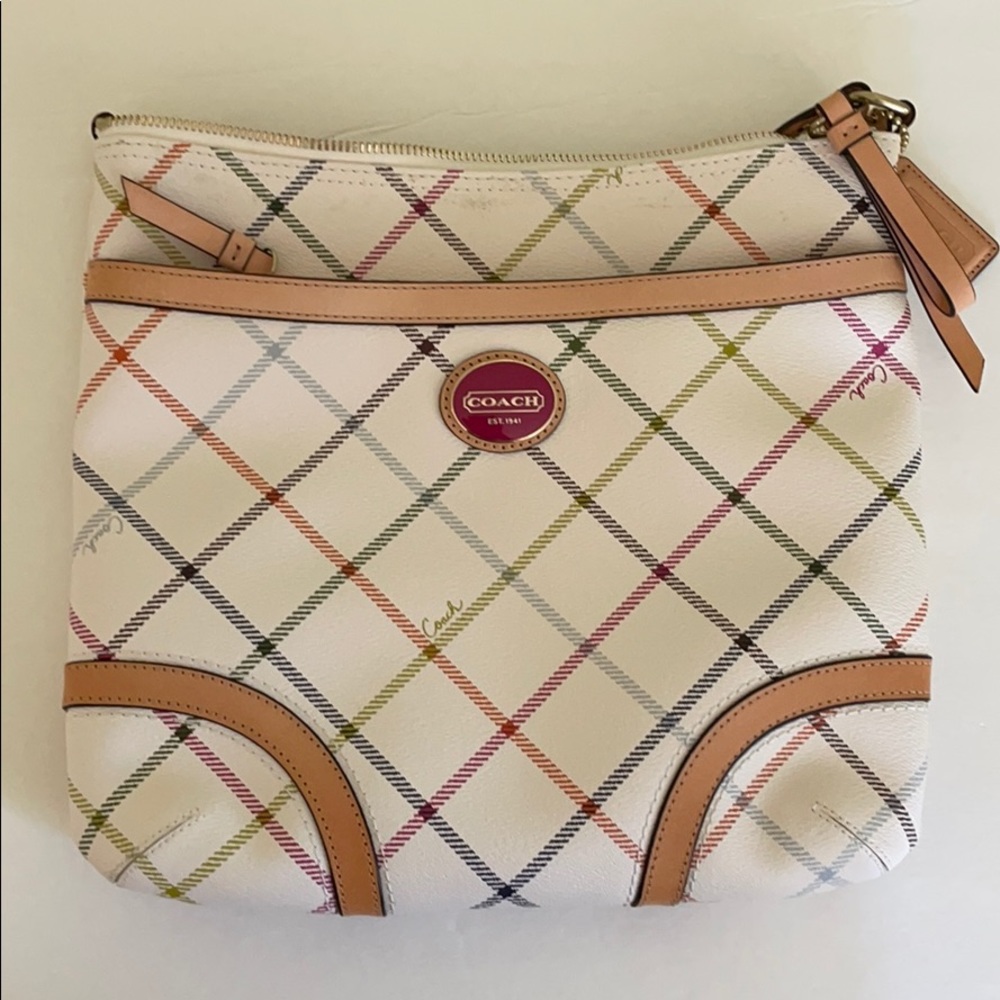 New w/ tags. Cream w/ rainbow accents Coach purse